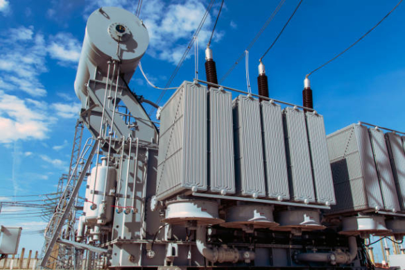 Large industrial power transformer for high voltage substation. Power engineering.